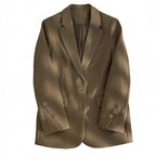 Brown blazer on a white background